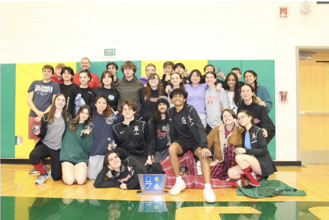 The+Bernards+High+School+fencing+team+celebrates+their+district+accomplishments+